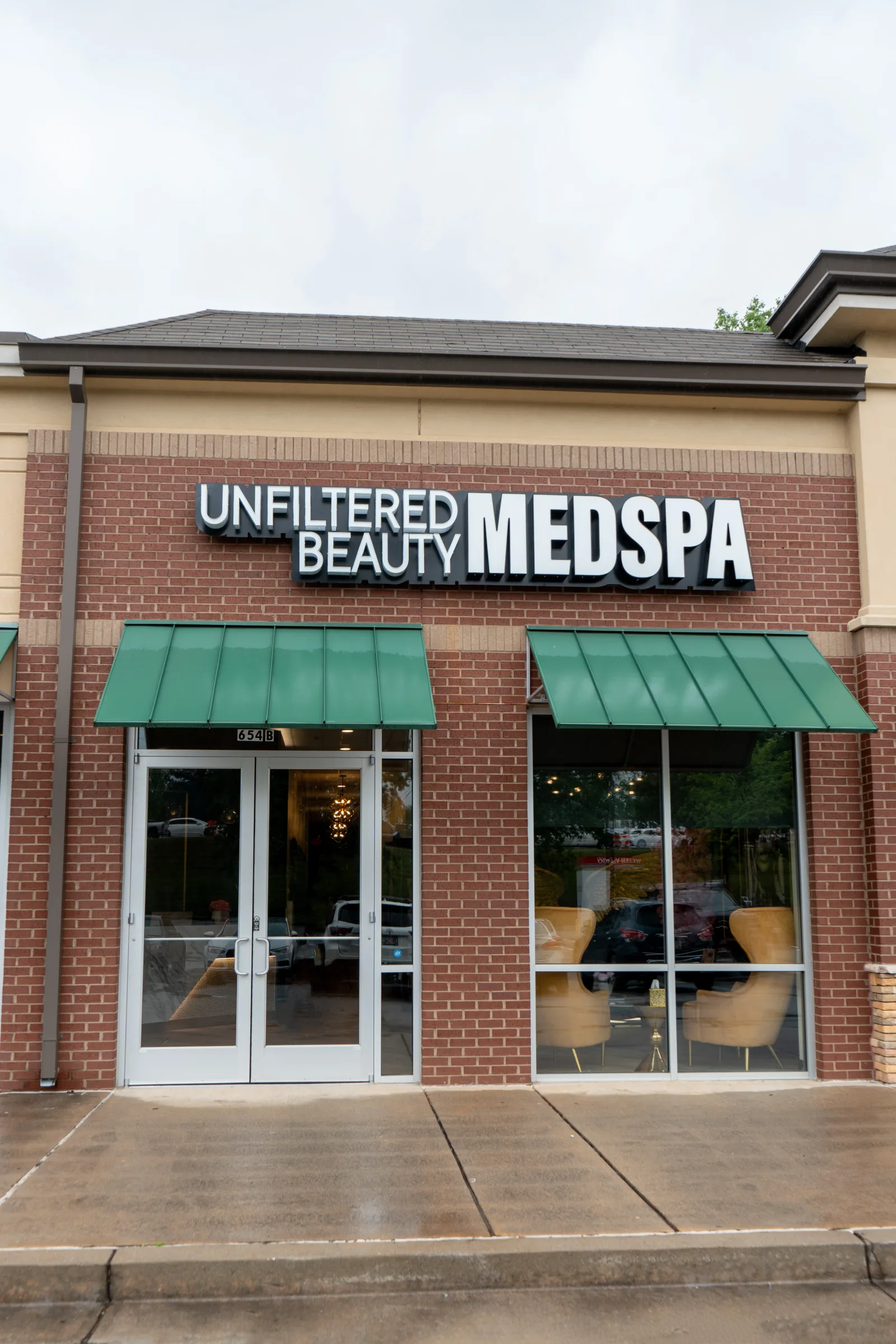 The Unfiltered Beauty MedSpa storefront on Dawsonville Highway